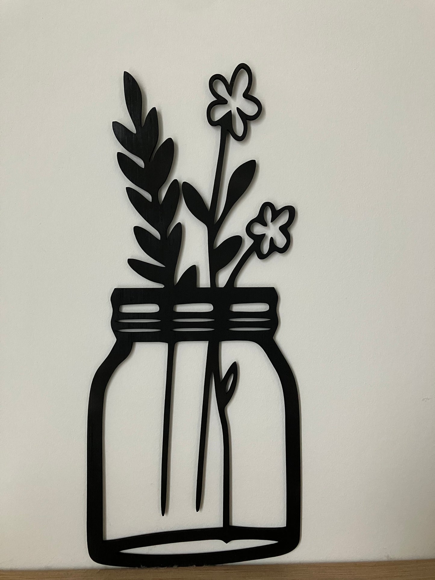 Bloemen in vaasjes