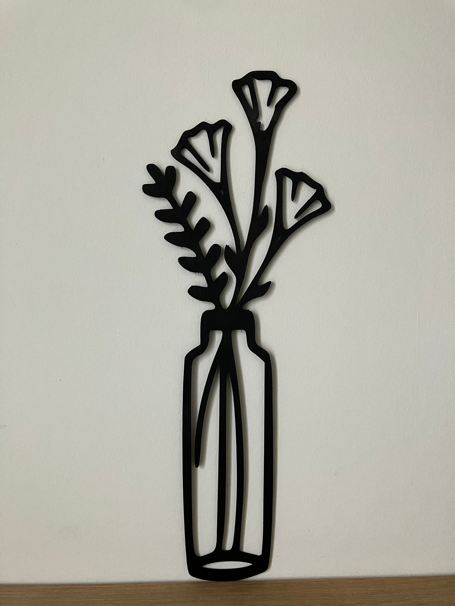 Bloemen in vaasjes