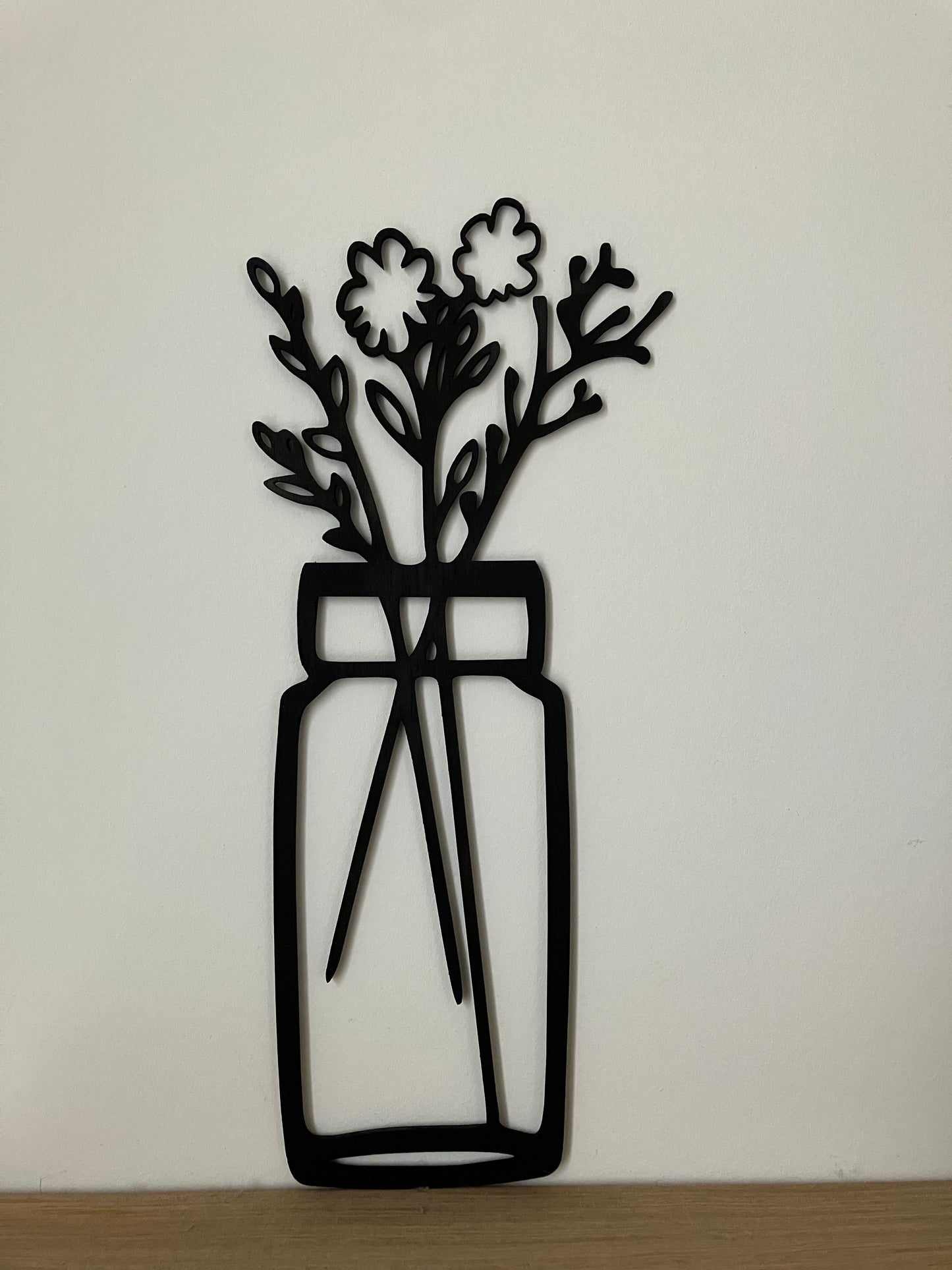 Bloemen in vaasjes